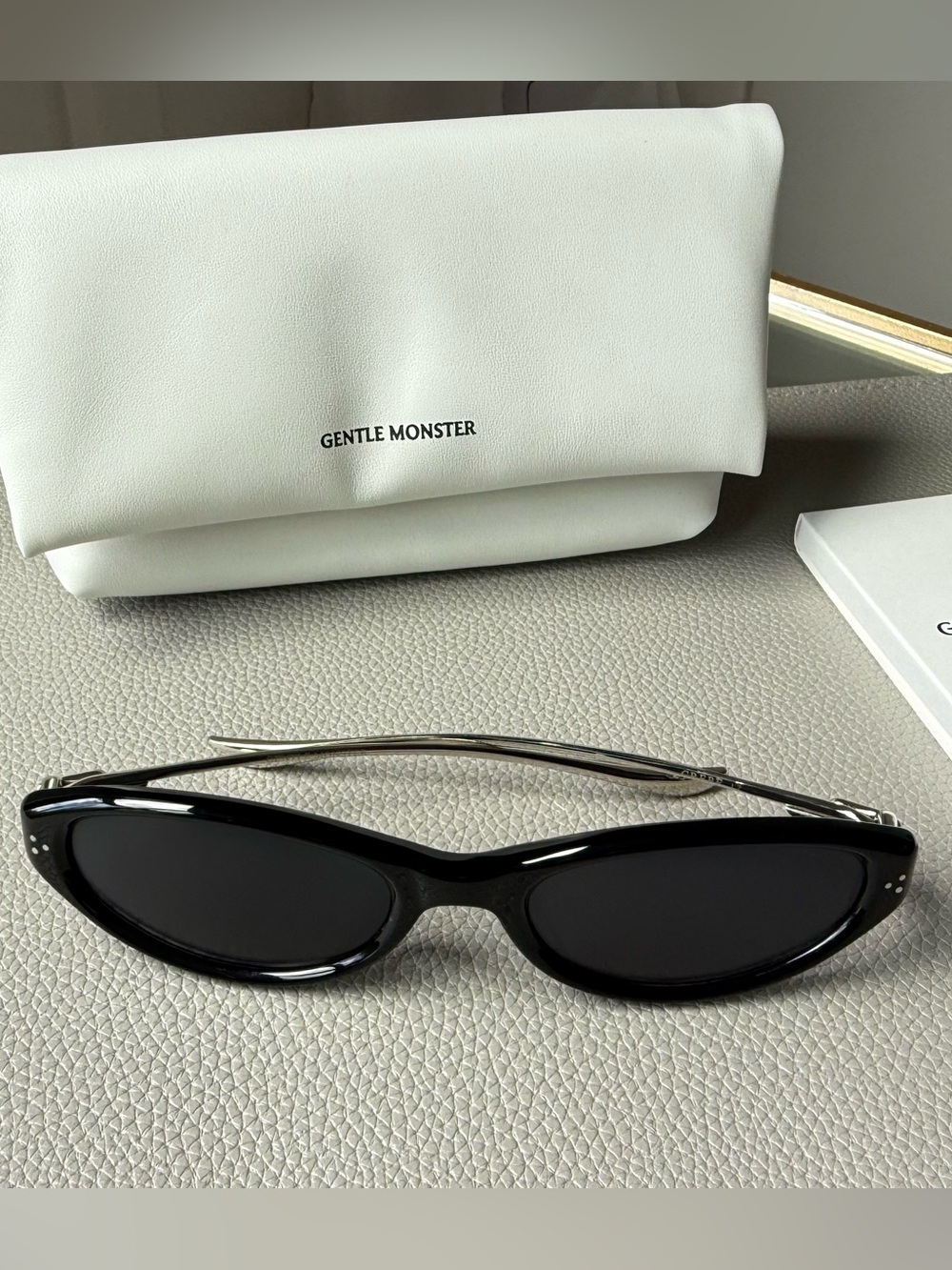 GENTLE MONSTER Black Cat-Eye Sunglasses with Silver Temples